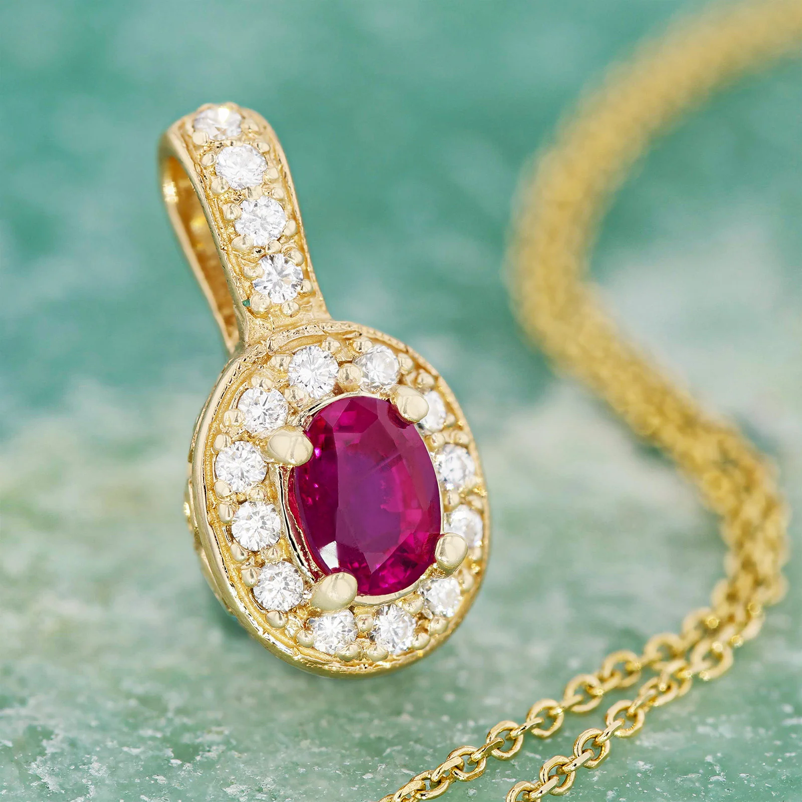 Oval Ruby Pendant with Diamond Halo in 14k Yellow Gold - Image 3